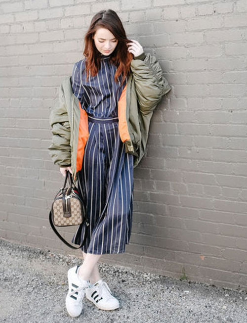 A Stripe Jumpsuit, Olive Green Jacket, and Sneakers